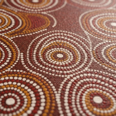 Traditional Aboriginal dot painting on a textured canvas