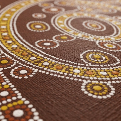 Traditional Aboriginal dot painting motifs on a textured canvas surface